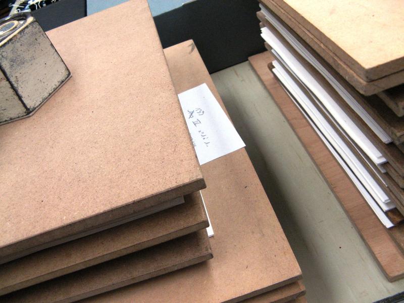 19. Folios of Ms. 139 in the press.
